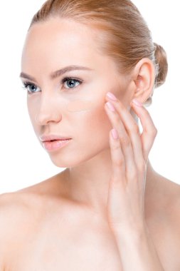 woman with foundation cream on face clipart