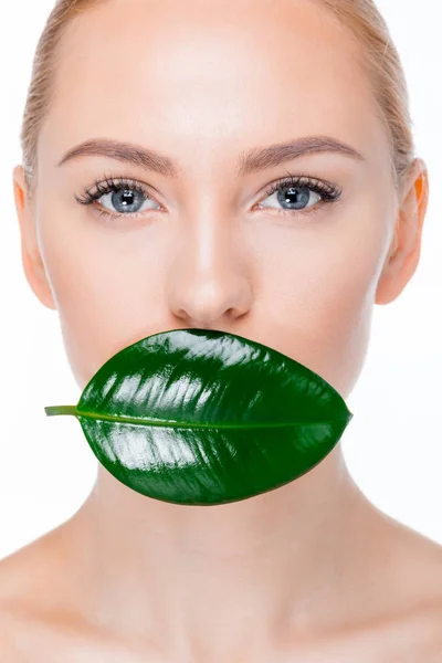 Woman with green leaf — Stock Photo, Image