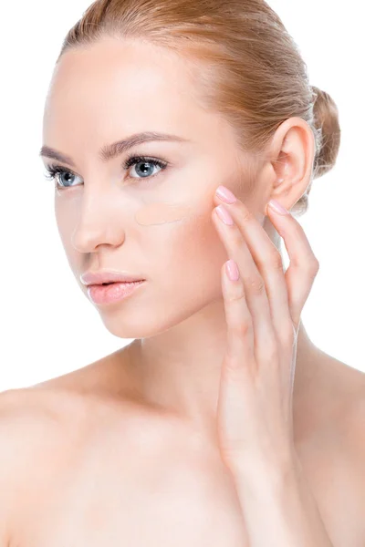 Woman with foundation cream on face — Stock Photo, Image