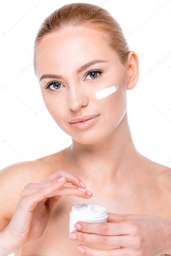 woman applying cream