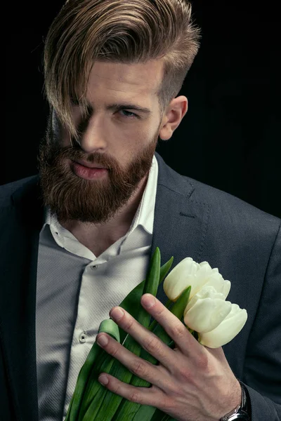 Stylish man with tulips — Stock Photo, Image