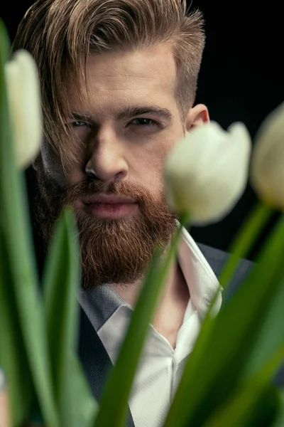 Stylish man with tulips — Stock Photo, Image