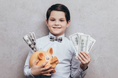 child holding piggy bank clipart
