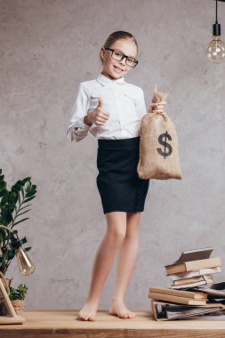 kid with money bag clipart