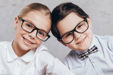 smiling children in eyeglasses clipart