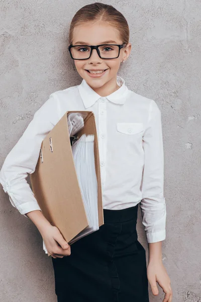 Child with folder in hand — Stock Photo, Image