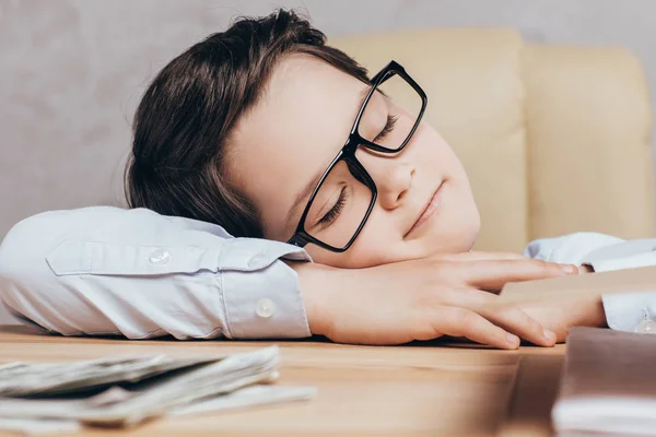 Little boy sleeping at workplace — Stock Photo, Image