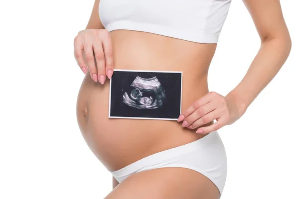 Pregnant woman with ultrasound scan — Stock Photo, Image