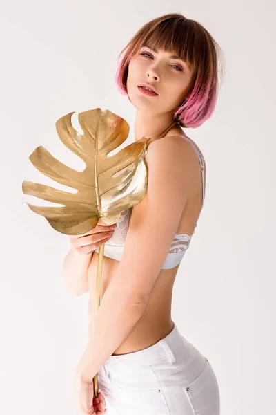 Woman posing with golden leaf — Stock Photo, Image