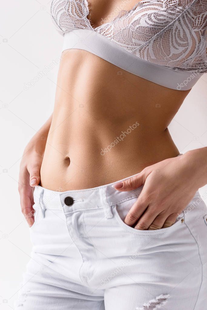 Exposed midsection of fit woman 