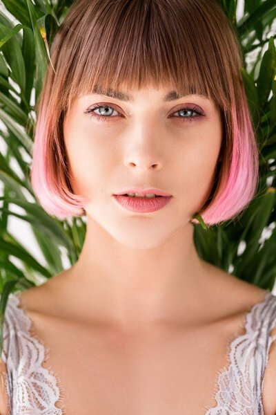 young woman with pink hair