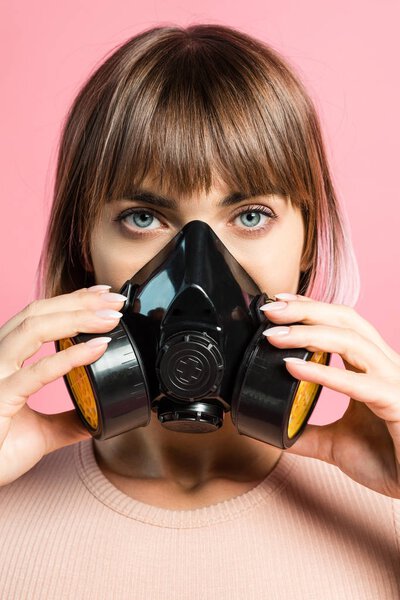 young woman wearing respirator