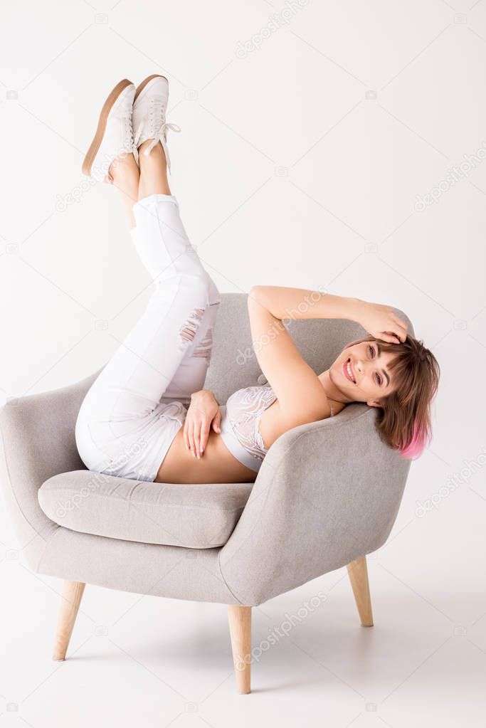 woman lying with legs in air