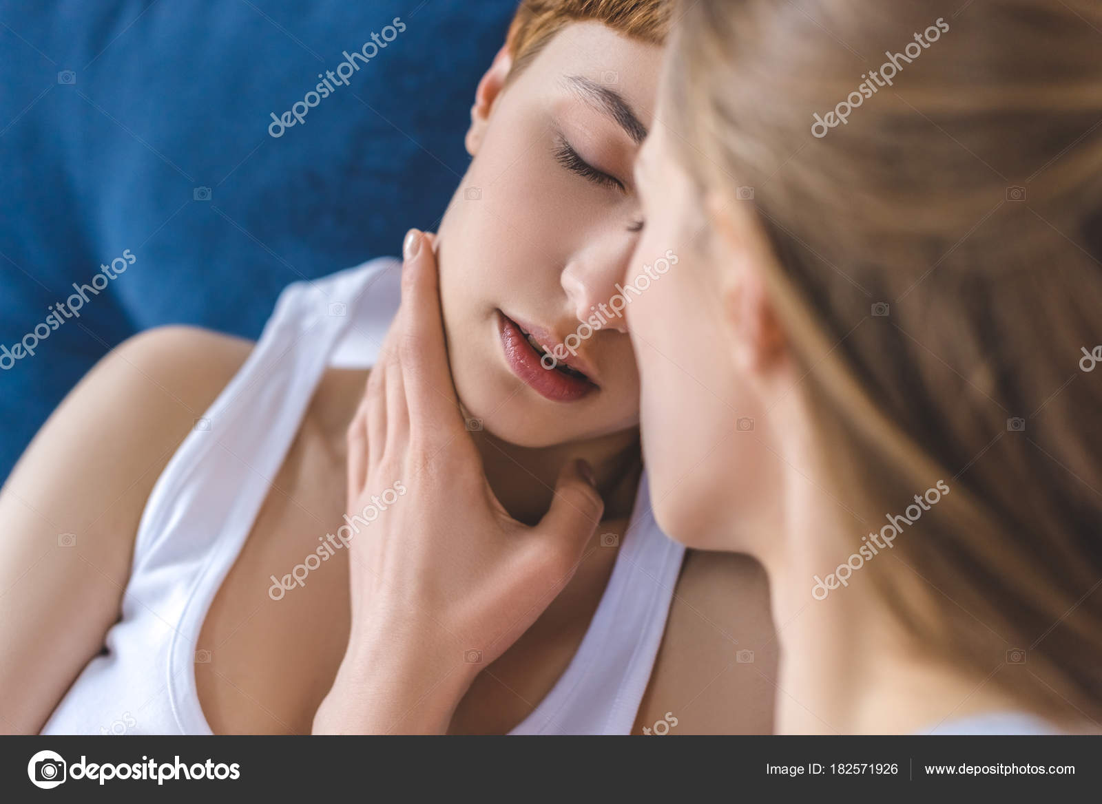 Lesbians Kissing On Couch
