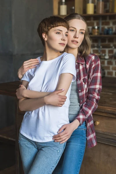 Happy Young Lesbian Couple Kitchen Home Stock Image