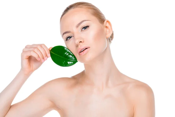 Woman with green leaf — Stock Photo