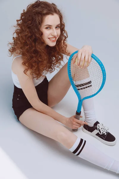 Young woman with racket — Stock Photo