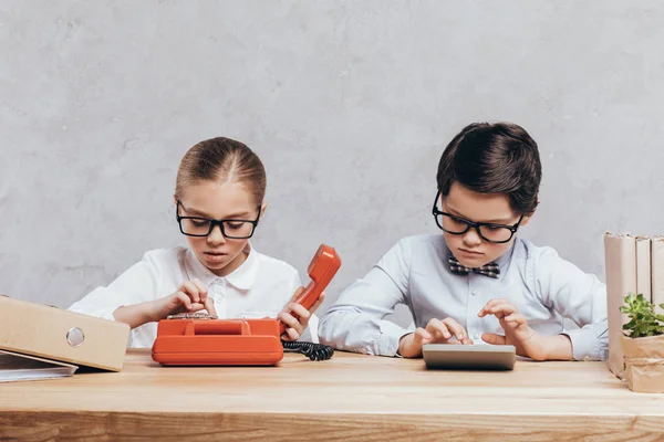 Kids working at workplace — Stock Photo