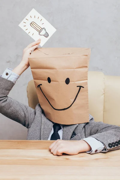 Child holding idea sign — Stock Photo