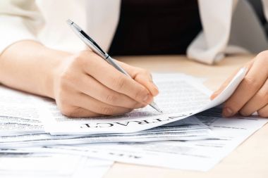 businesswoman signing contract