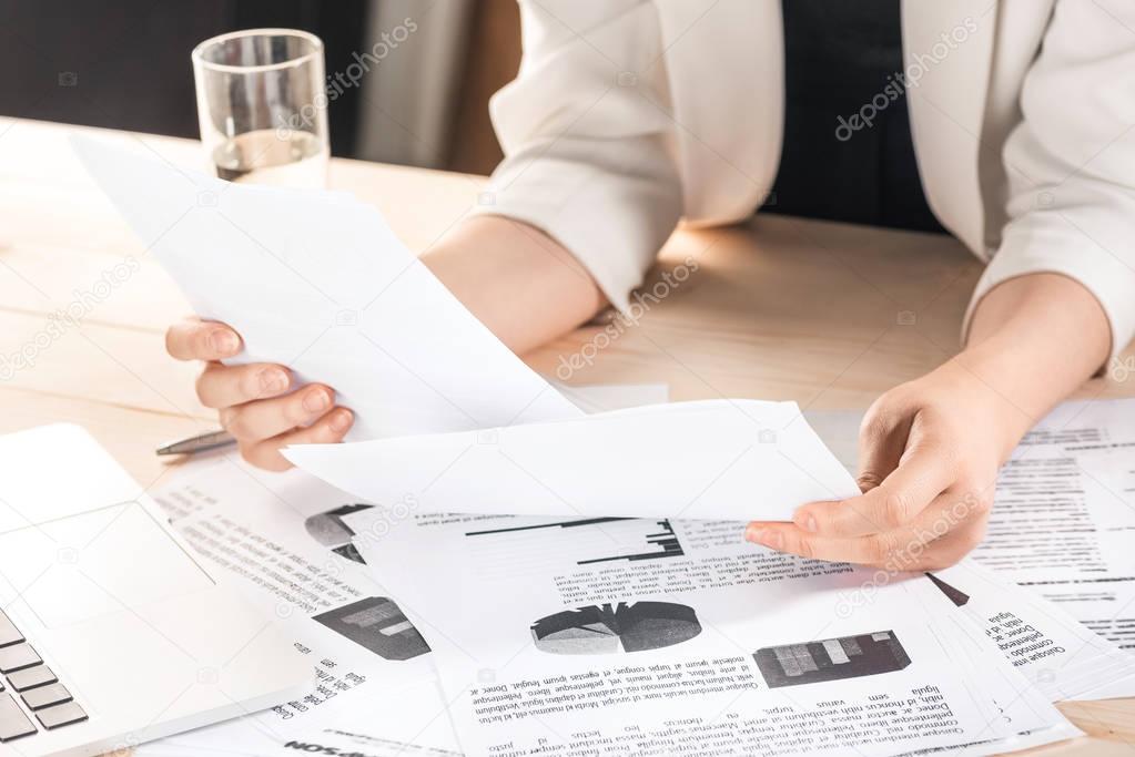 businesswoman with contract documents