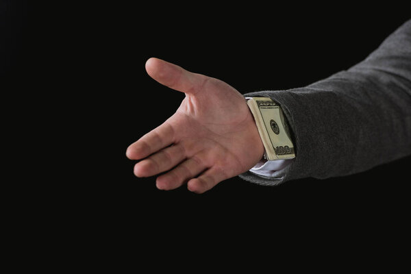 Бизнесмен с долларовыми банкнотами
