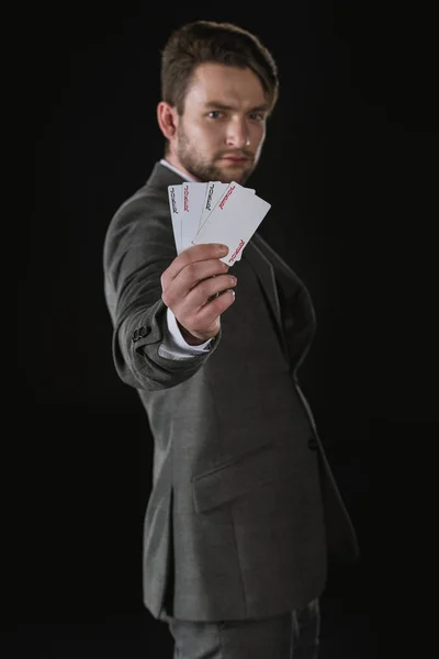Homem de negócios com cartões Joker — Fotografia de Stock