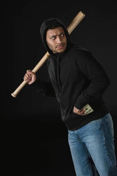 Robber with baseball bat and money — Stock Photo, Image