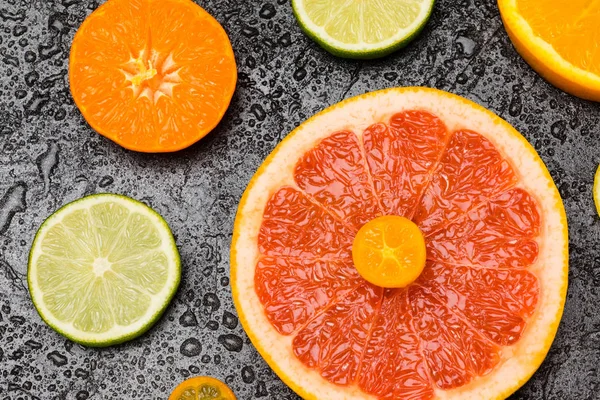 Citrus fruits slices — Stock Photo