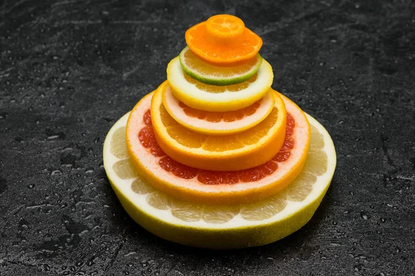 Citrus fruits slices — Stock Photo