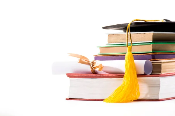 Graduation mortarboard and diploma — Stock Photo