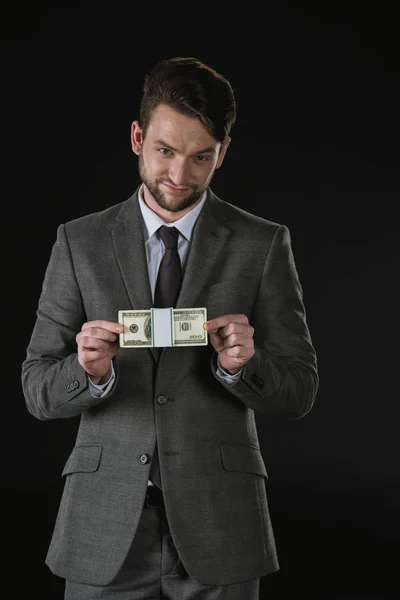 Homme d'affaires avec billets en dollars — Photo de stock