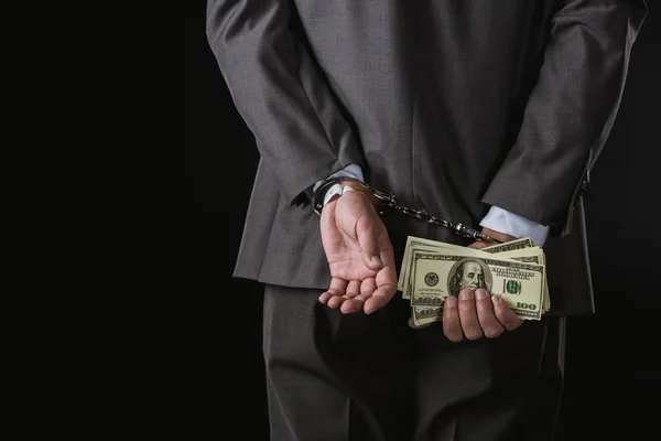 Businessman holding money — Stock Photo