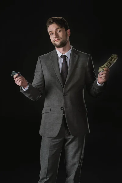 Businessman holding money — Stock Photo