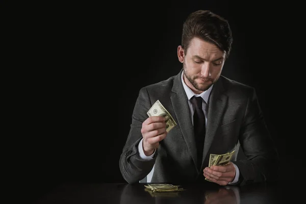 Businessman counting money — Stock Photo