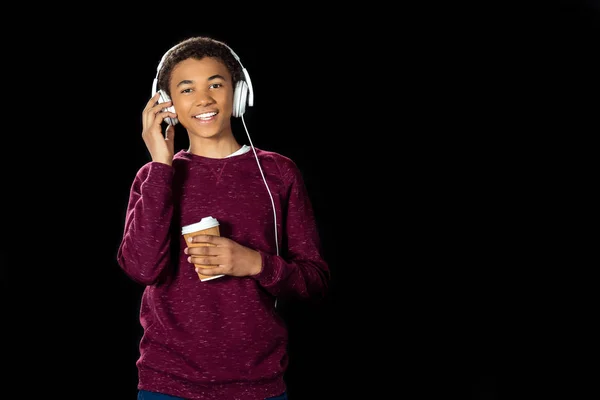 Teen boy listening music — Stock Photo