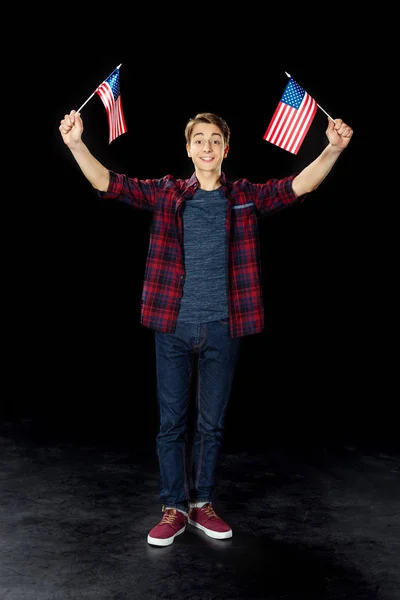 Teen boy with usa flags — Stock Photo