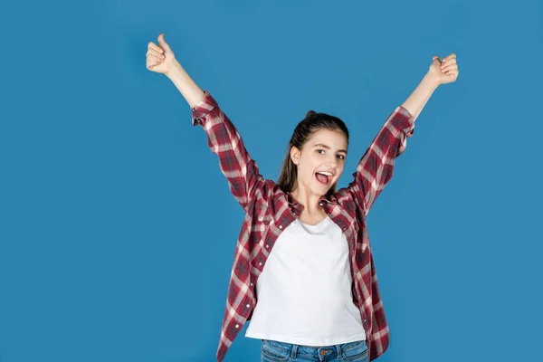 Teen girl raising hands — Stock Photo