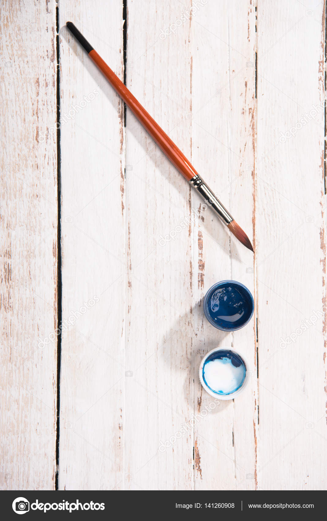 Paint container and brush Stock Photo by ©AndrewTovstyzhenko 141260908