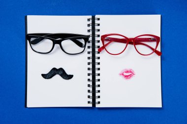 pairs of glasses on notebook clipart