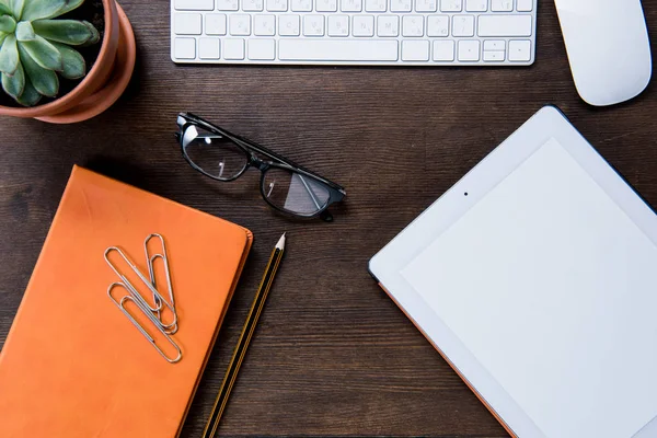 Digital tablet on desk — Stock Photo, Image