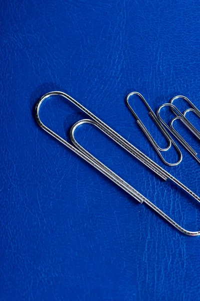 Office paperclips on table — Stock Photo, Image