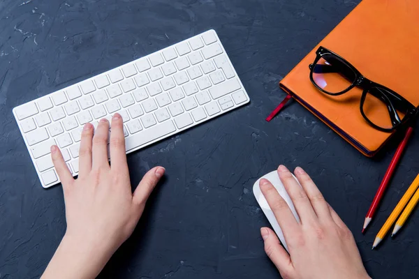 Hands with office supplies — Stock Photo, Image