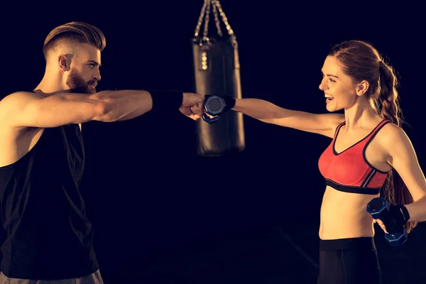 Sporty man and woman training — Stock Photo, Image