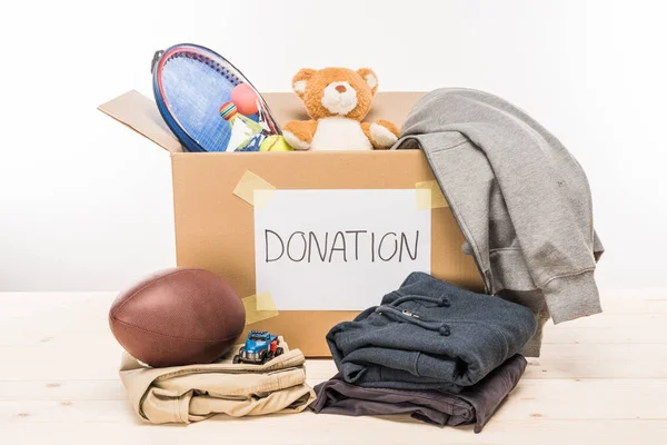 Cardboard box with donation — Stock Photo, Image