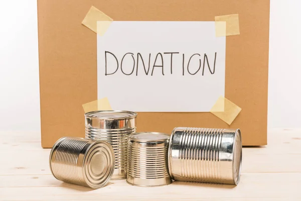 Latas de lata de doação — Fotografia de Stock