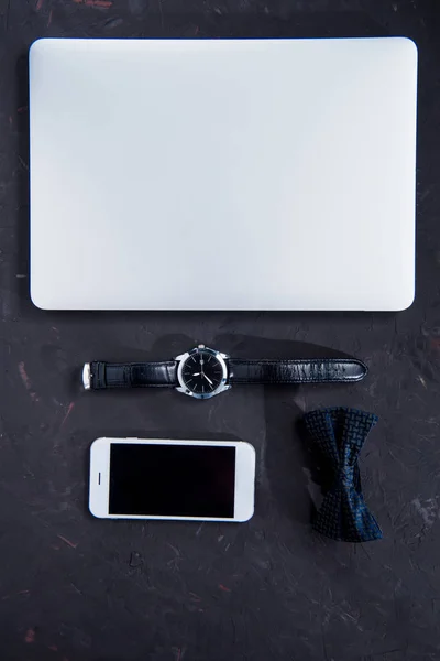 Digital devices and wristwatch — Stock Photo