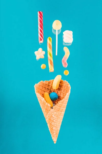 Waffle cone and candies — Stock Photo