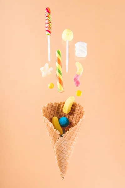 Waffle cone and candies — Stock Photo