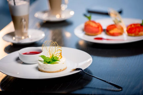 Tasty desserts on table — Stock Photo